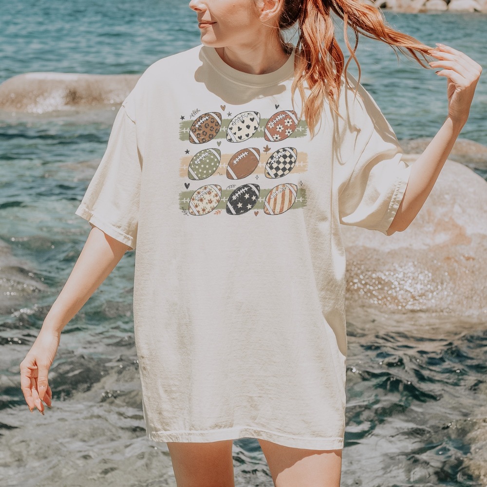 Nine Patterned Footballs in a Boho Grid Tee